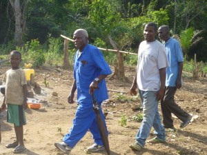 Pastor Gbarwee with umbrella
